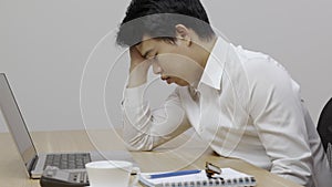 Man with narcolepsy is fall asleep on office desk.Narcolepsy is a sleep disorder