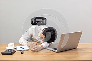 Man with narcolepsy is fall asleep on office desk.Narcolepsy is a sleep disorder that makes people very drowsy during the day photo