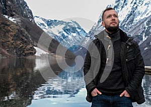 Man near Naeroyfjord in Gudvangen village, Norway