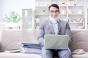 The man in neck brace cervical collar working from home teleworking