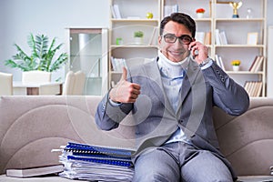 The man in neck brace cervical collar working from home teleworking