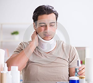 Man with neck brace after whiplash injury