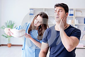 The man with neck injury visiting doctor for check-up