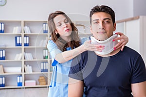 The man with neck injury visiting doctor for check-up