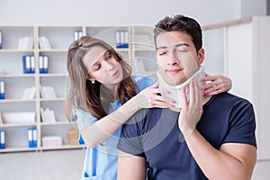 The man with neck injury visiting doctor for check-up