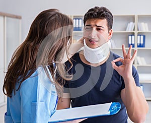 Man with neck injury visiting doctor for check-up