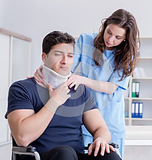 Man with neck injury visiting doctor for check-up