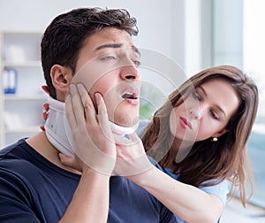 Man with neck injury visiting doctor for check-up