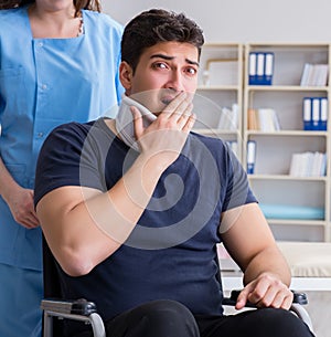 Man with neck injury visiting doctor for check-up