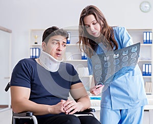 Man with neck injury visiting doctor for check-up