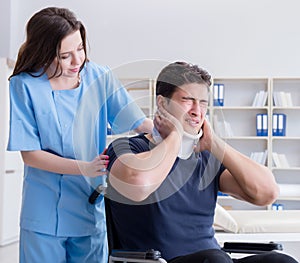 Man with neck injury visiting doctor for check-up