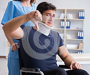 Man with neck injury visiting doctor for check-up