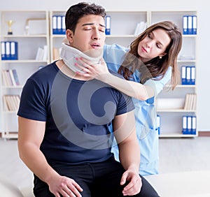 Man with neck injury visiting doctor for check-up