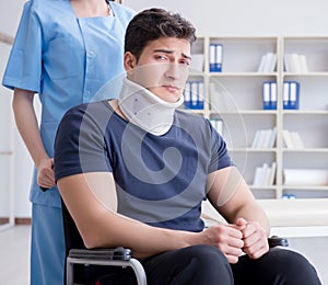 Man with neck injury visiting doctor for check-up