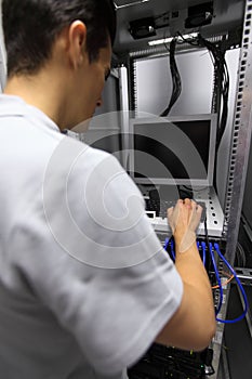 Man in network server room
