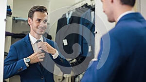 Man in a new suit at clothing store