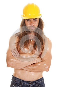 Man no shirt hard hat arms folded