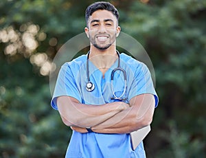 Man, nurse portrait and arms crossed of healthcare and wellness professional outdoor. Success, doctor motivation and