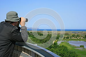 Man observing wildlife