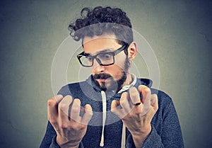 Man with obsessive compulsive disorder exploring cleanliness of hands.