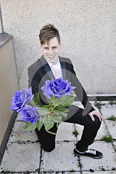 Man offering a bunch of roses