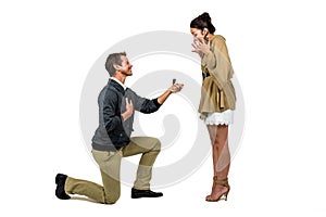 Man offering engagement ring to partner