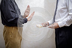 Man Offering a Hryvnia bribe to a Man Refusing it