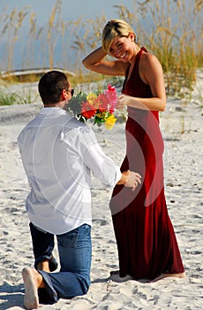 Man offering woman flowers