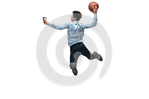 Man in office clothes playing basketball on white background. Unusual look for businessman in motion, action. Sport