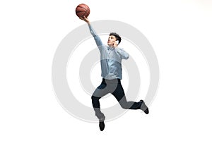 Man in office clothes playing basketball on white background. Unusual look for businessman in motion, action. Sport