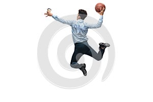 Man in office clothes playing basketball on white background. Unusual look for businessman in motion, action. Sport