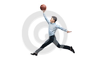 Man in office clothes playing basketball on white background. Unusual look for businessman in motion, action. Sport