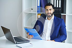 Man In Office. Portrait Of Male Worker