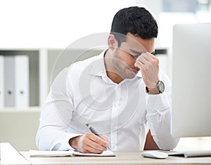 Man, office and stress with writing notes fro research as web designer with deadline or overtime. Website developer photo