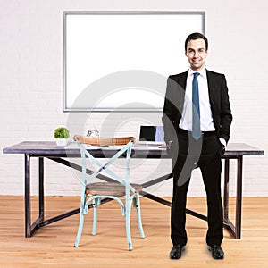 Man in office with whiteboard