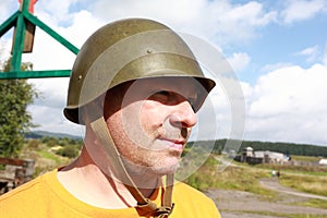 Man in old military helmet