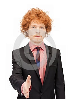 Man with an open hand ready for handshake