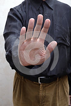 Man With Open Hand to Say Stop to Corruption