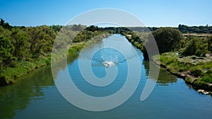 Man open water swimming front crawling a river in Vendee France