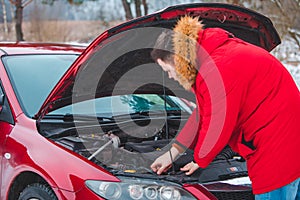 man opened car hood breakdown at highway road