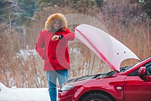 man opened car hood breakdown at highway road