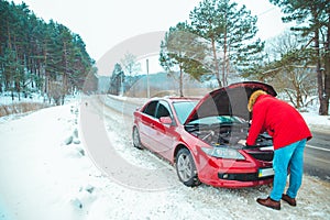 man opened car hood breakdown at highway road