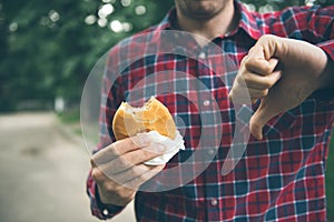 Man opening a hamburger