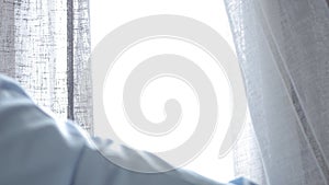 Man Opening the Window Curtain on a Sunny Morning in a Hotel Room