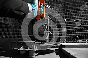 Man operating a circular saw on a workbench