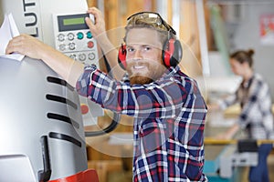 man operating machine