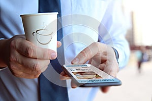 Man is ordering food on the internet using an app, restaurant meals delivery online