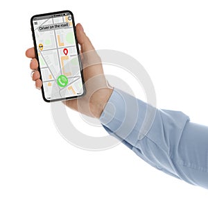 Man ordering taxi with smartphone on background, closeup