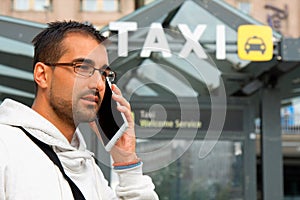 Man orders a taxi from his cell phone