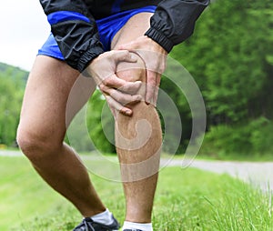Man out jogging with knee pain